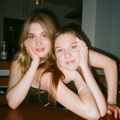 Sophie Nélisse posing with her younger sister Isabella Nelisse 